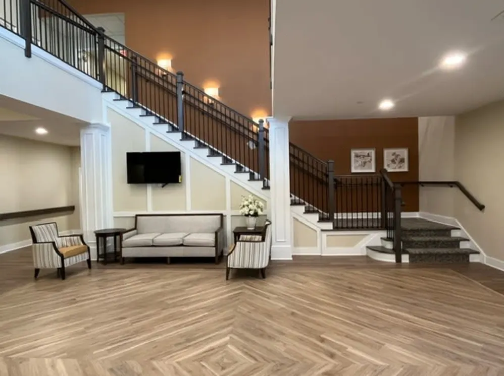 Modern lobby with staircase and seating area